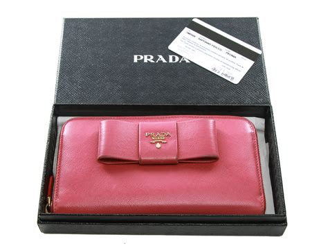 1m0506 prada wallet|Authentic Prada Saffiano pink leather ribbon zip around wallet.